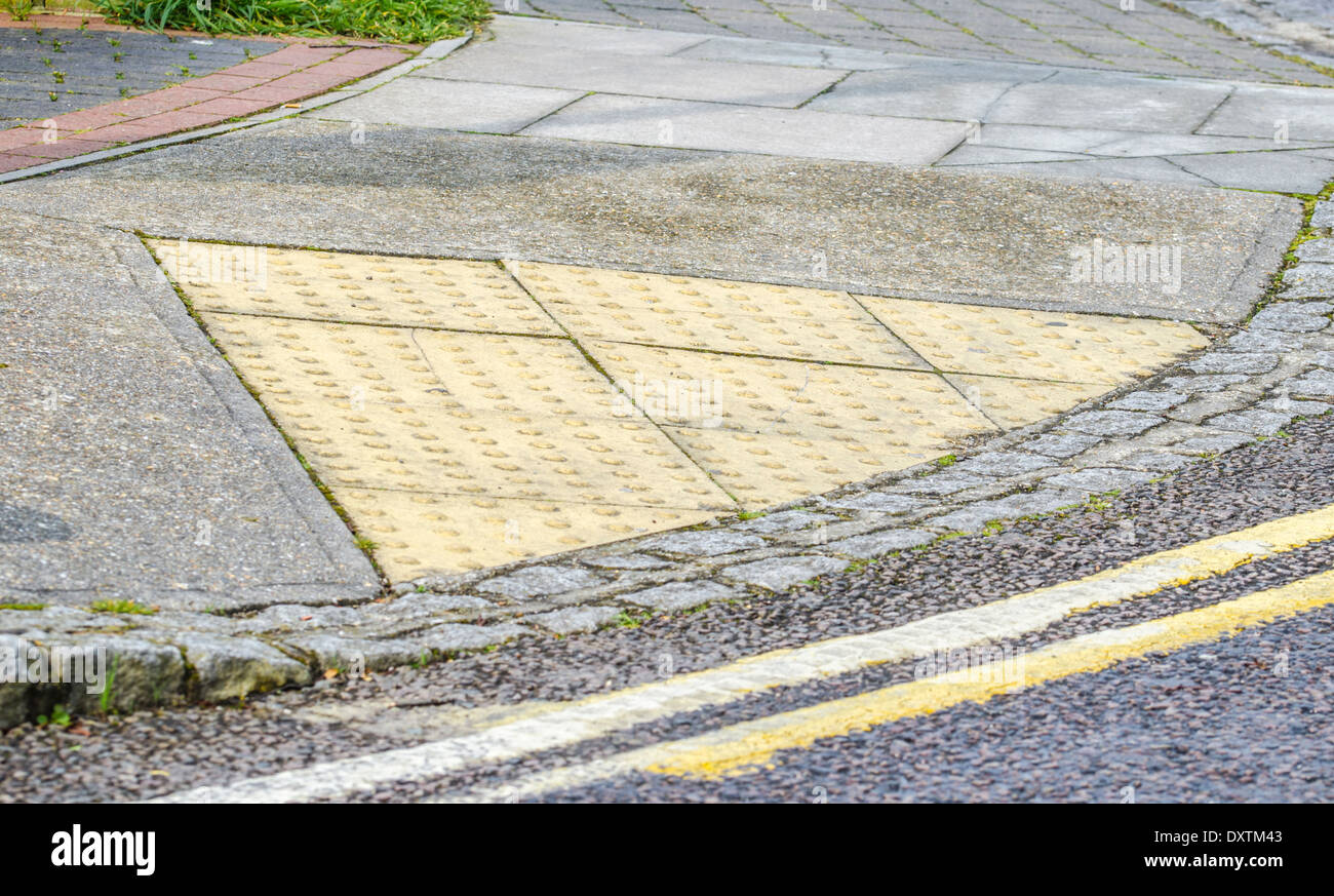 Tactile Paving surface on a pavement. Stock Photo