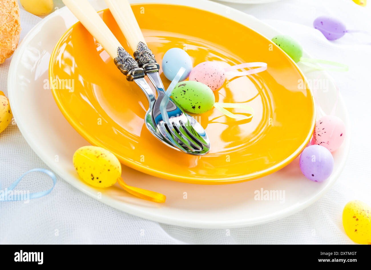 Closeup of Easter place setting with eggs Stock Photo