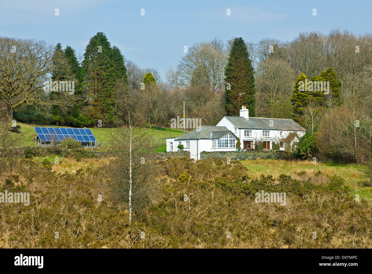Ash Cottage, with solar panels, near Bowness, Lake District National Park, Cumbria, England UK Stock Photo