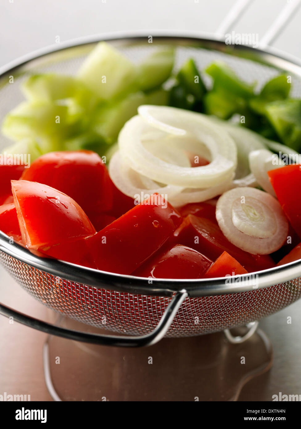 Chopped vegetables in a colander Stock Photo Alamy
