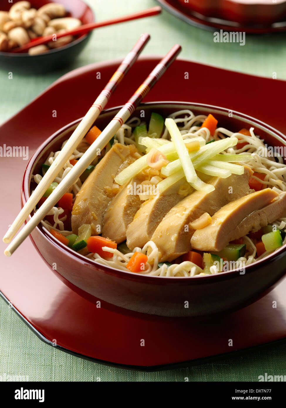 Chinese-style chicken with noodles and vegetables Stock Photo - Alamy