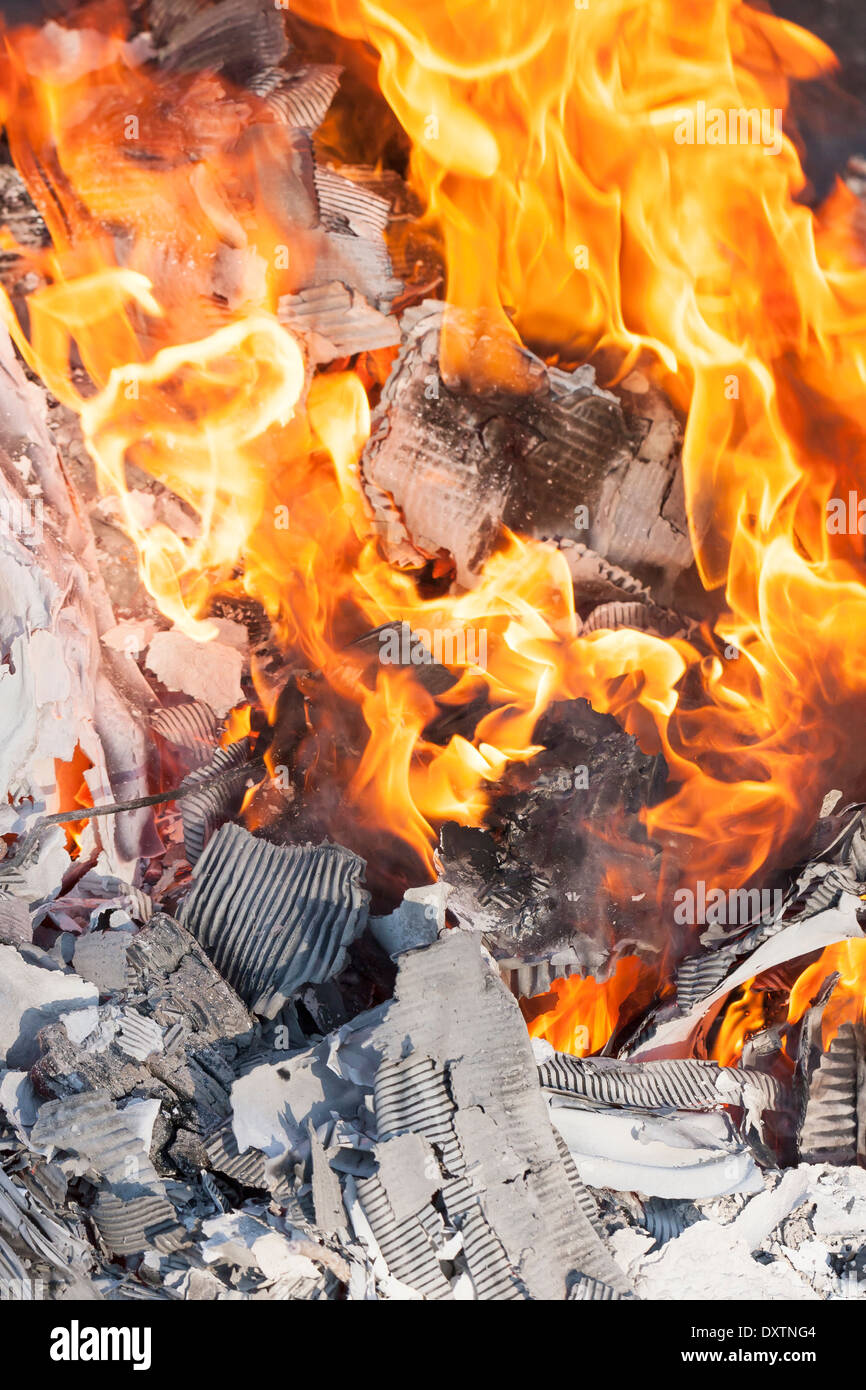 Fire flames and ash of a burning camp fire Stock Photo