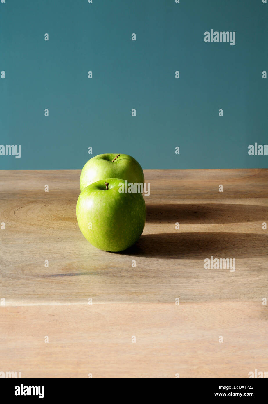 Two Granny Smith apples Stock Photo