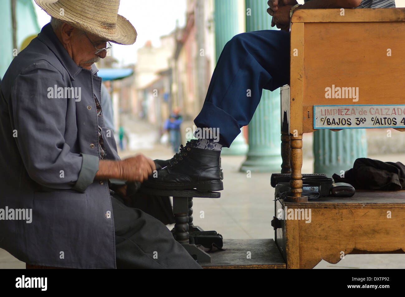 Shoe shiner working in the Spanish colonial town Sancti Spiritus. Cuba