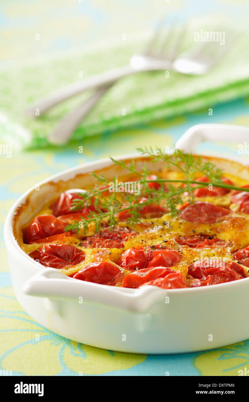 Cherry tomato and goat's cheese bake Stock Photo Alamy