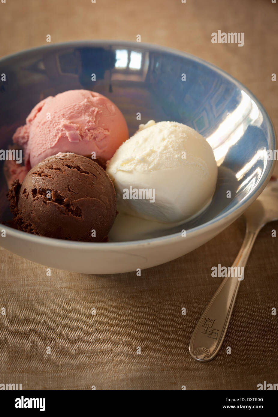 Scoop of vanilla,chocolate and strawberry ice cream Stock Photo Alamy