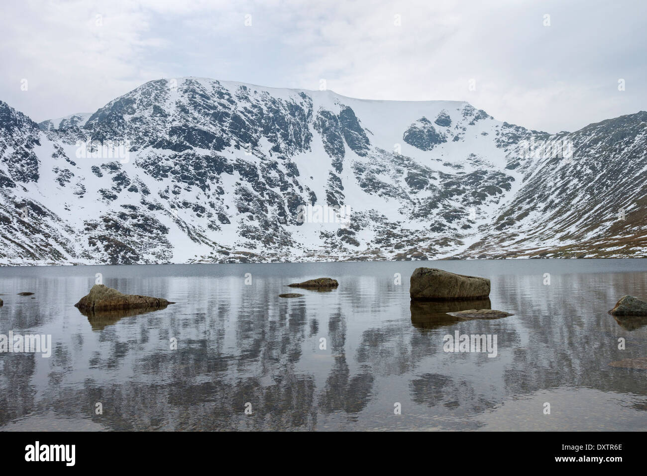 Helvellyn from Red Tarn in Winter Lake District Cumbria UK Stock Photo