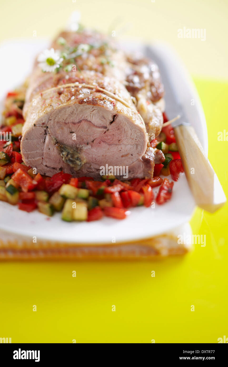 Shoulder of lamb stuffed with blue cheese Stock Photo Alamy