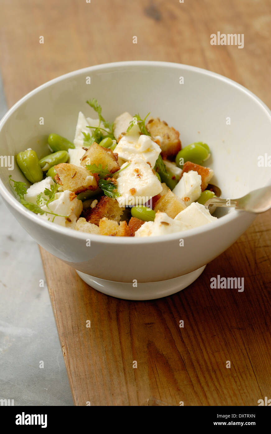 Broad bean,feta and garlic crouton salad Stock Photo