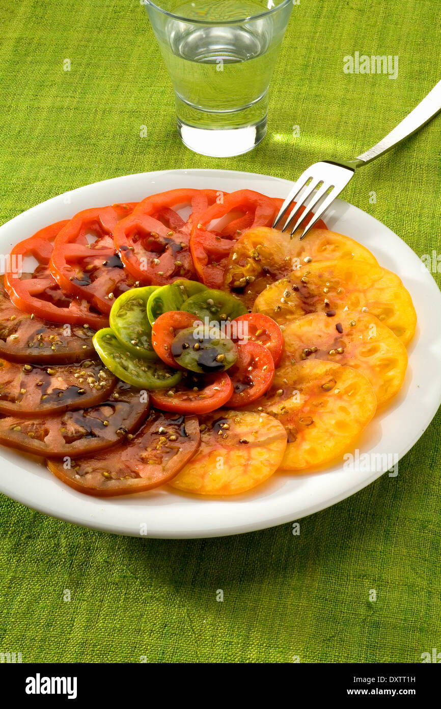 Multicolored tomato salad Stock Photo