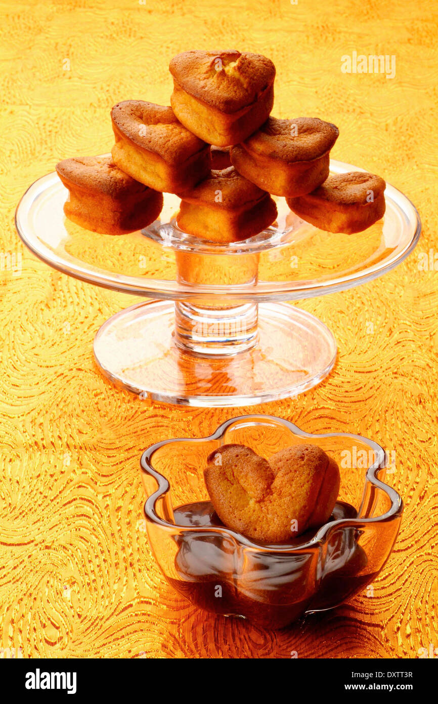 Heart-shaped apple mini cakes with chocolate sauce Stock Photo