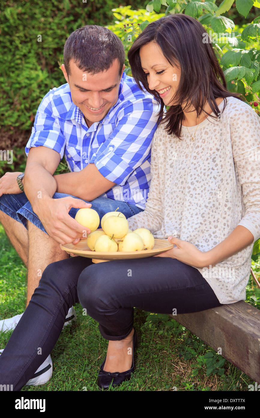 a couple making picnic on the meadow Stock Photo