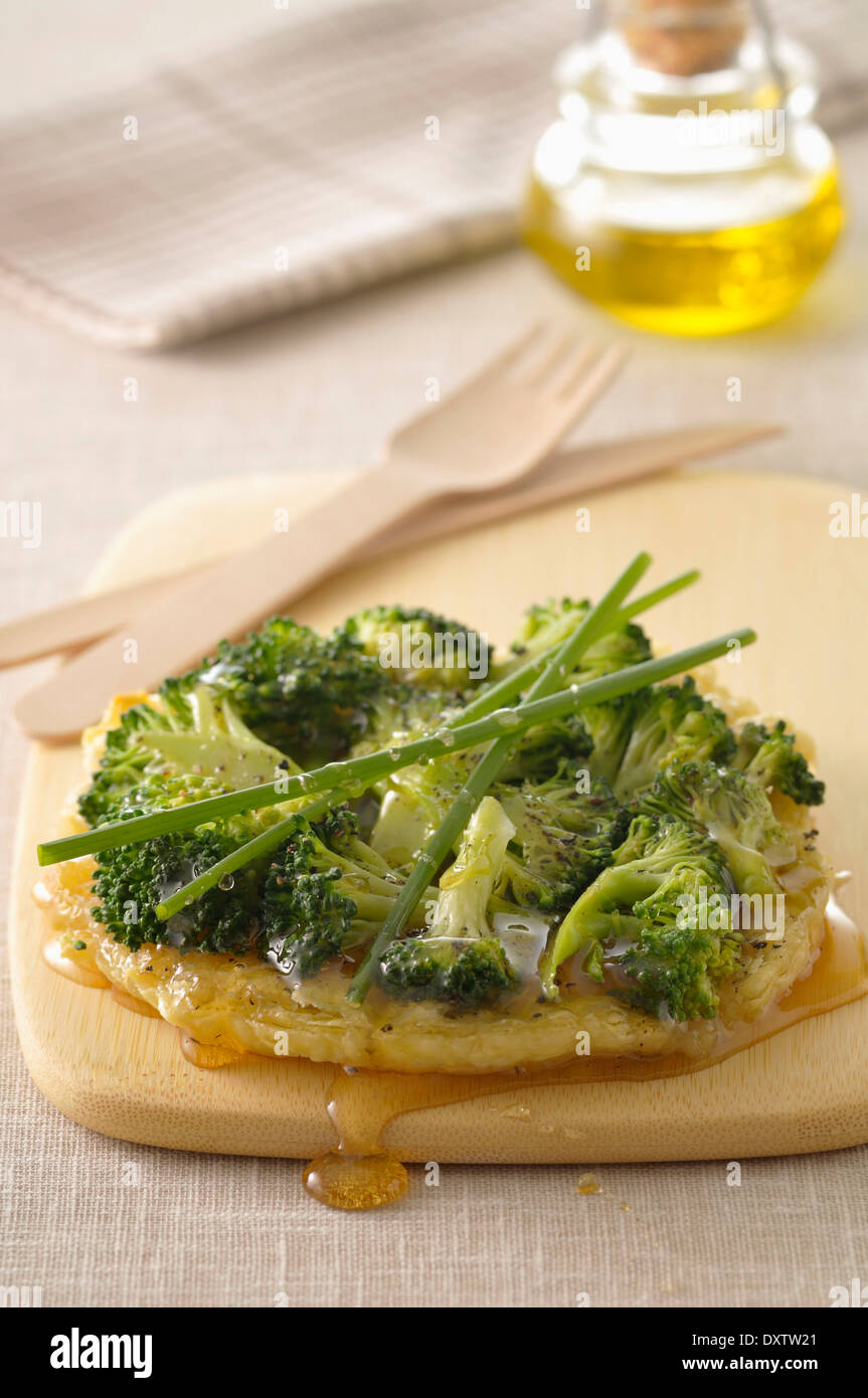 Broccoli and goat's cheese tatin tarts Stock Photo Alamy