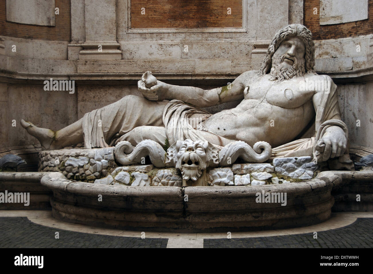 Marphurius or Marforio. One of the talking statues of Rome. 1st century A.D. Marble sculpture. Reclining bearded river god. Stock Photo