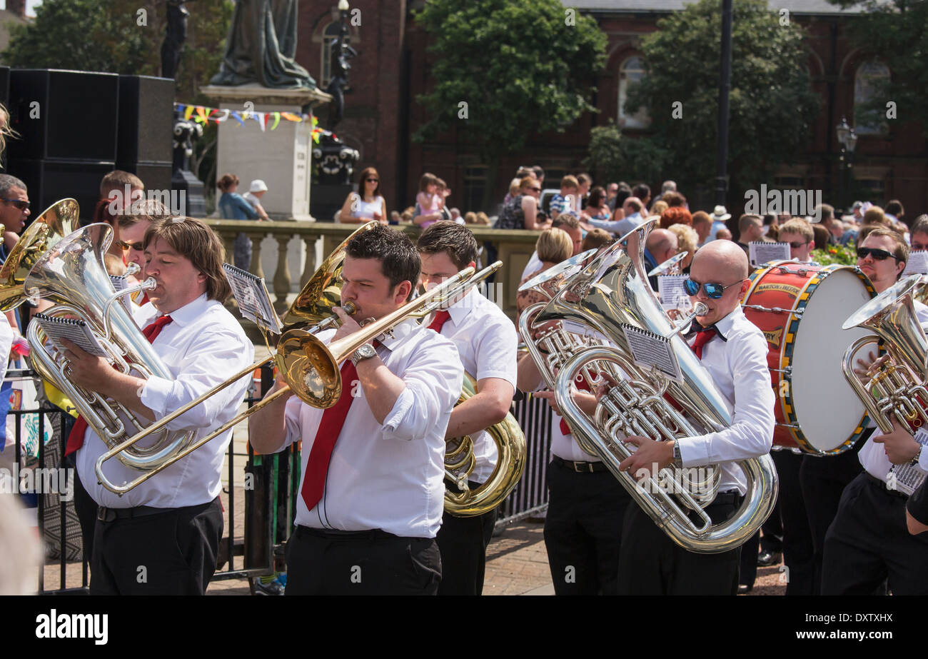 A marching band performs on the street; South Shields, Tyne and Wear