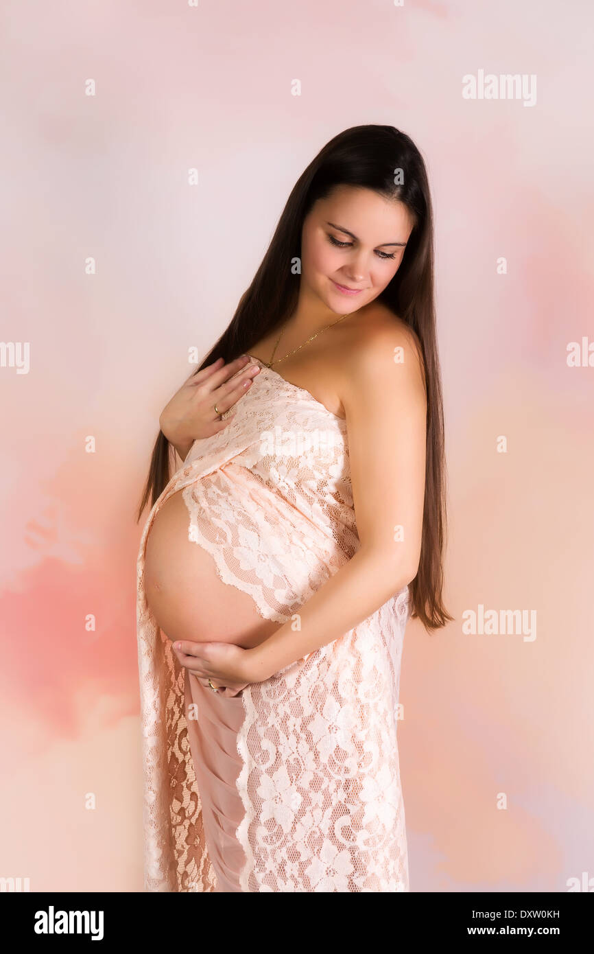 Women with baby bump hi-res stock photography and images - Page 4 - Alamy