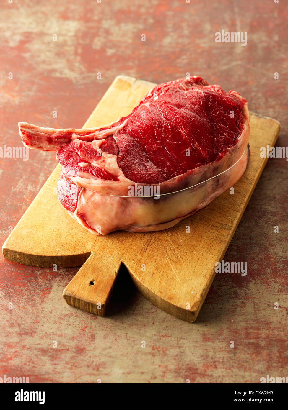 Thick raw beef chop Stock Photo