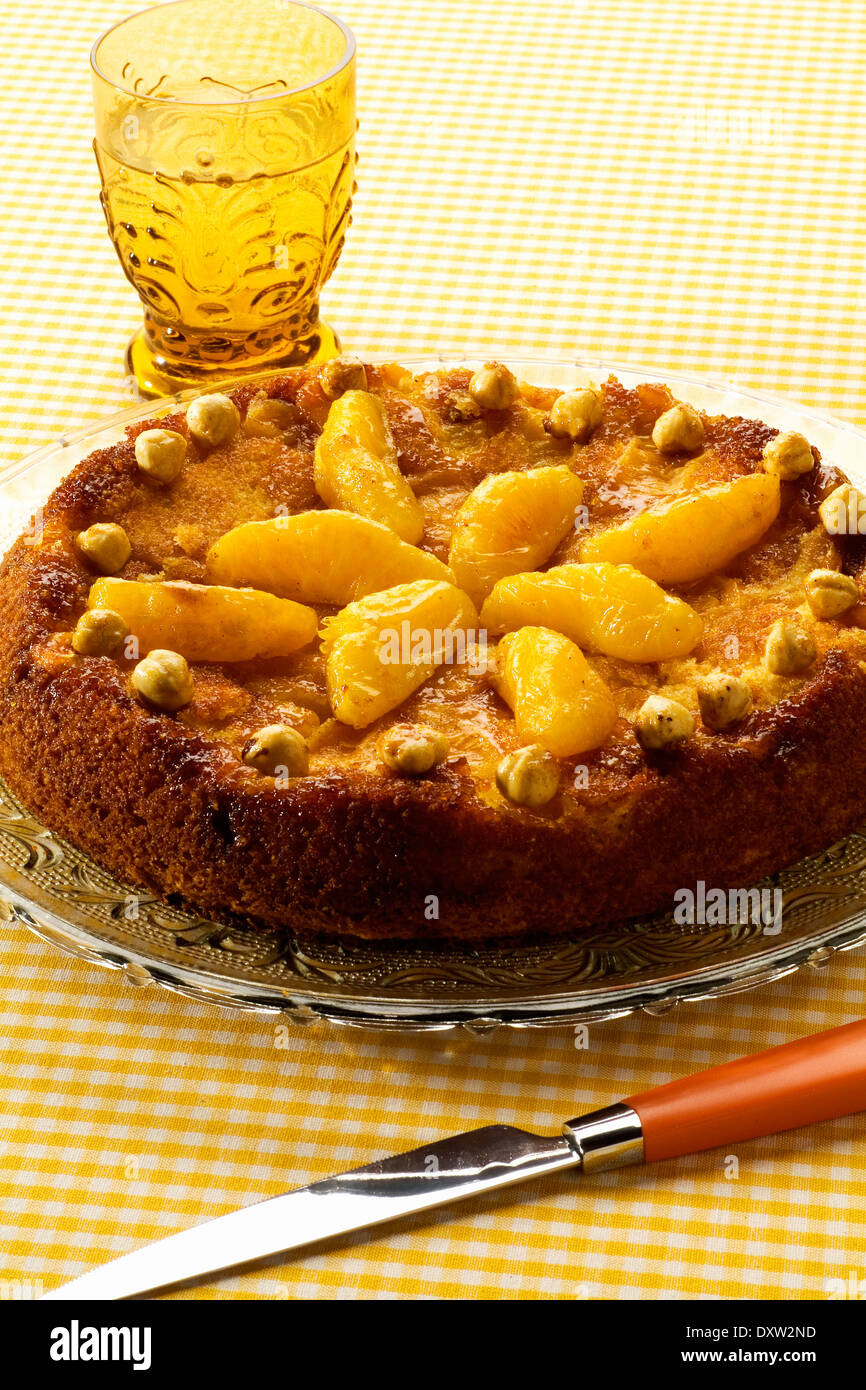 Orange and hazelnut caramelized cake Stock Photo