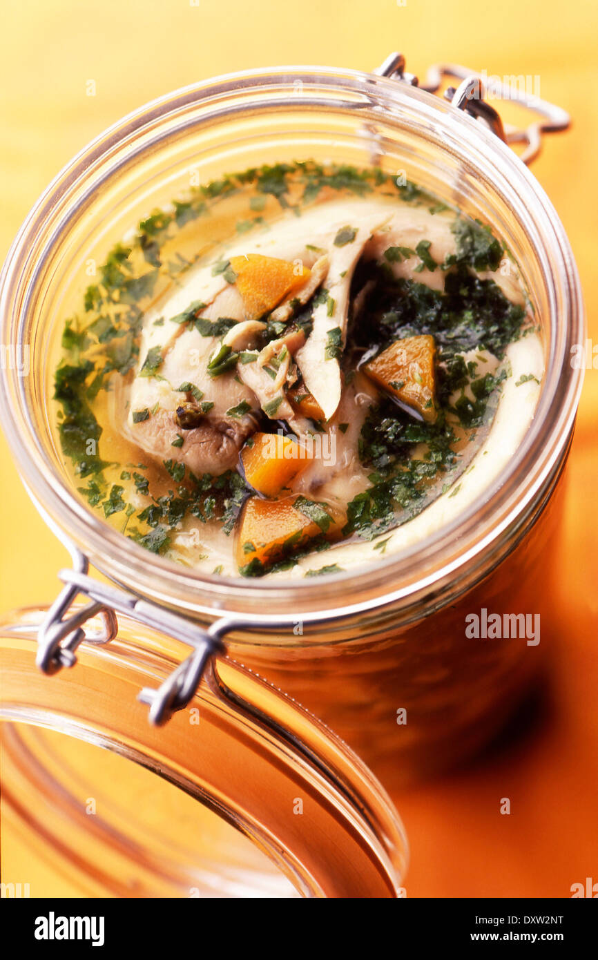 Jar of rabbit with cilantro Stock Photo