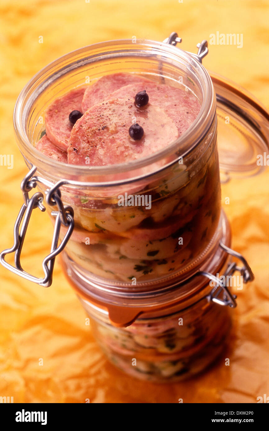 Jar of Saucisson de Lyon and potatoes Stock Photo