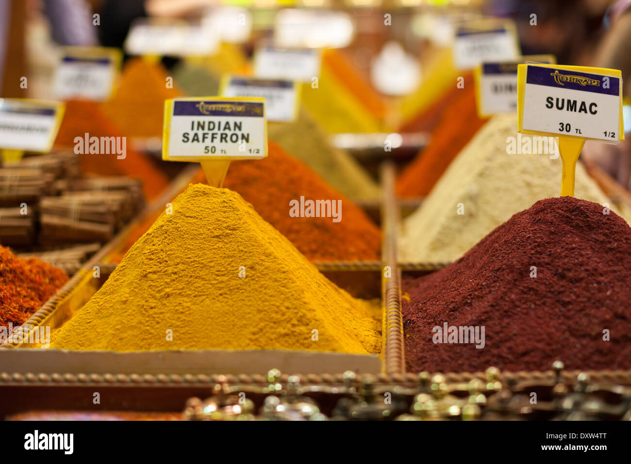 Spices in turkish market stall. Pseudo Saffronand Sumac on Bazaar in Fatih, Istanbul, Turkey Stock Photo