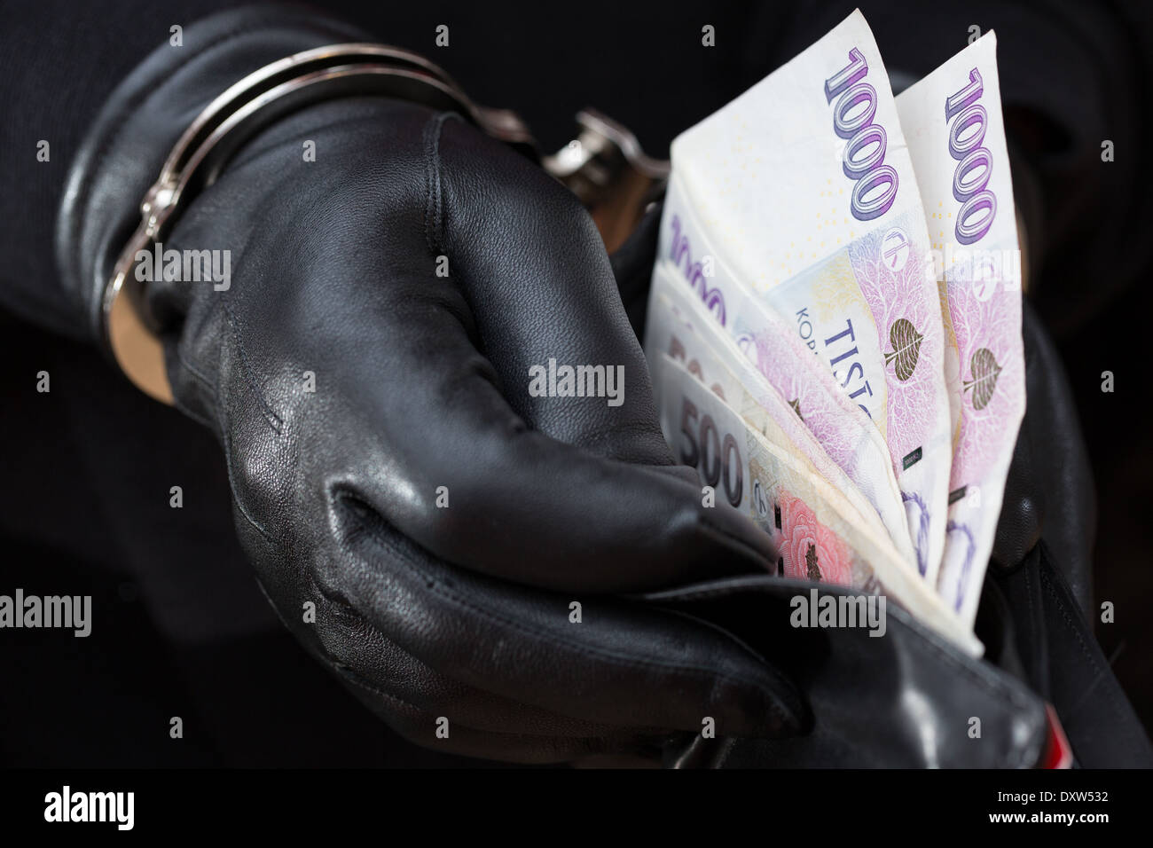 closeup of hands with gloves in handcuffs Stock Photo Alamy