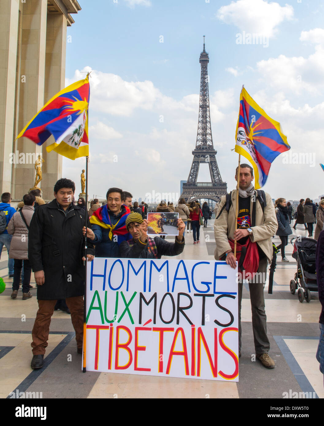 The Tibetan, Taiwanese Ethnic Communities of France, Demonstration called for French citizens to mobilize during the visit of Chinese President in Paris, on Place of the Rights of Man. Group Holding Protest signs Stock Photo