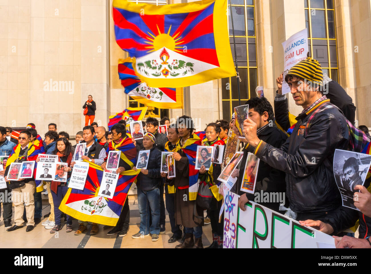 Large Cowd People, Front, The Tibetan, Taiwanese Ethnic Communities of France, and Friends called for French citizens to mobilize during the visit of Chinese President  in Paris protest for justice, protest against china, tibetan activists, international Politics Stock Photo