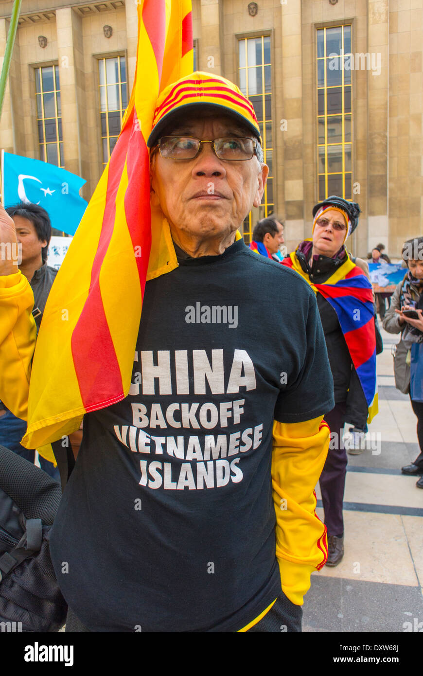 The Tibetan, Taiwanese Ethnic Communities of France, called for French citizens to mobilize during the visit of Chinese President in Paris, Man Wearing Protest Slogan t-Shirt against Island occupation Stock Photo