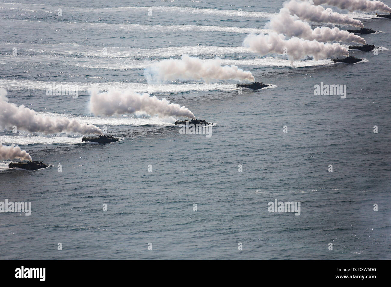 South Korean Marines amphibious assault vehicles approach the beach during a simulated amphibious assault part of joint training exercise Ssang Yong March 31, 2014 in Doksu-Ri, Pohang, South Korea. Stock Photo