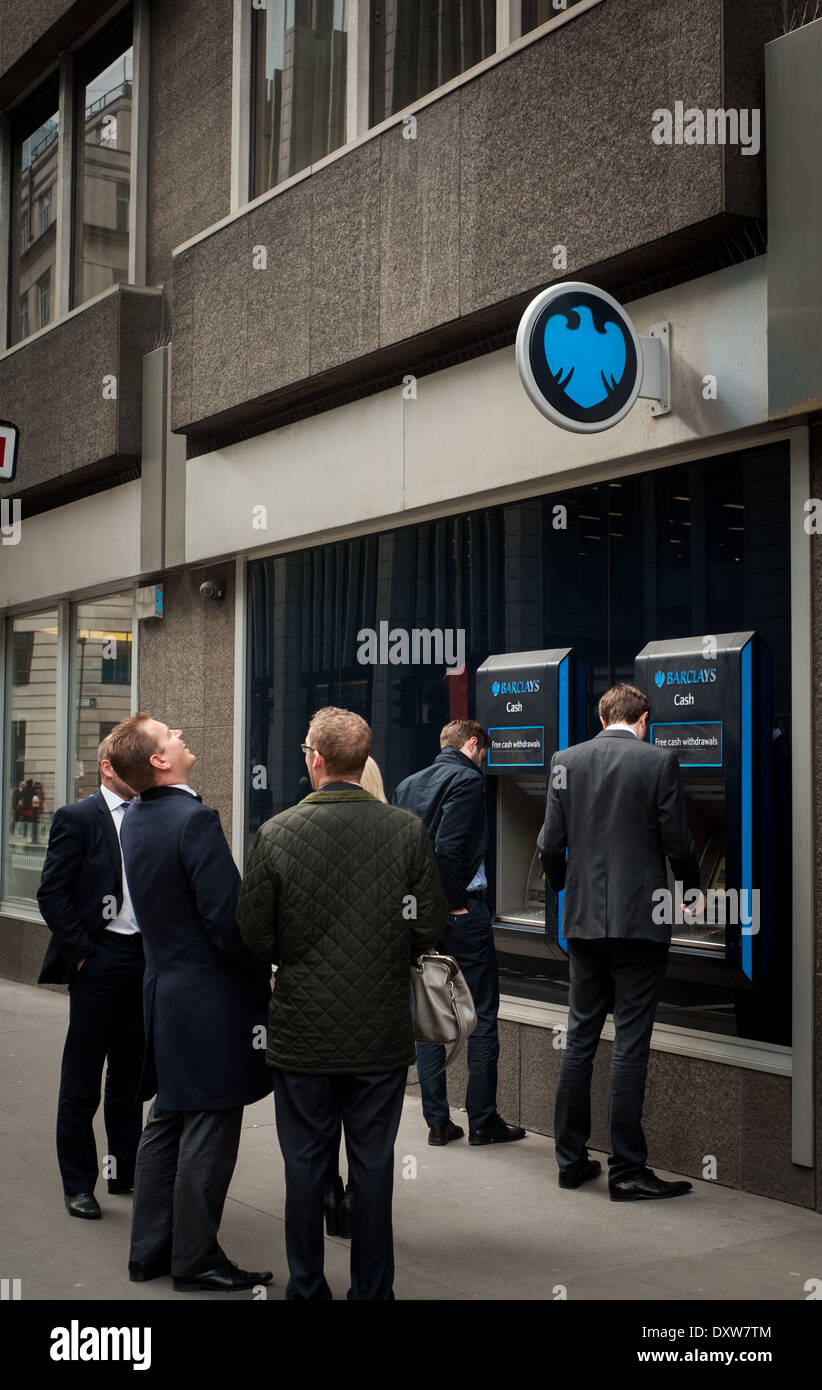 City workers at Barclay's Bank cashpoint machine Stock Photo