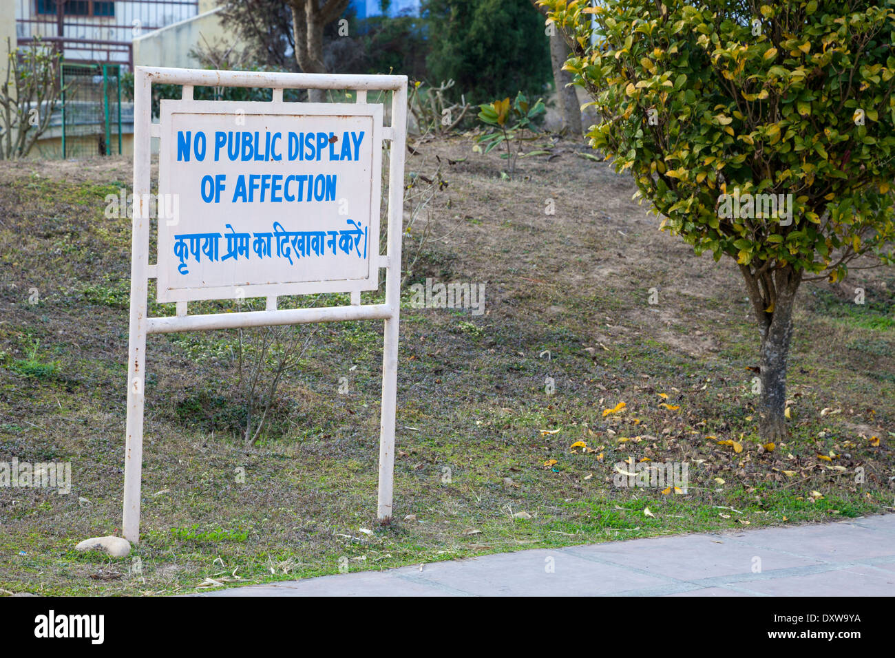 India, Dehradun. Sign on Grounds of the Buddhist Temple of Dehradun and Mindrolling Monastery. No Public Display of Affection. Stock Photo