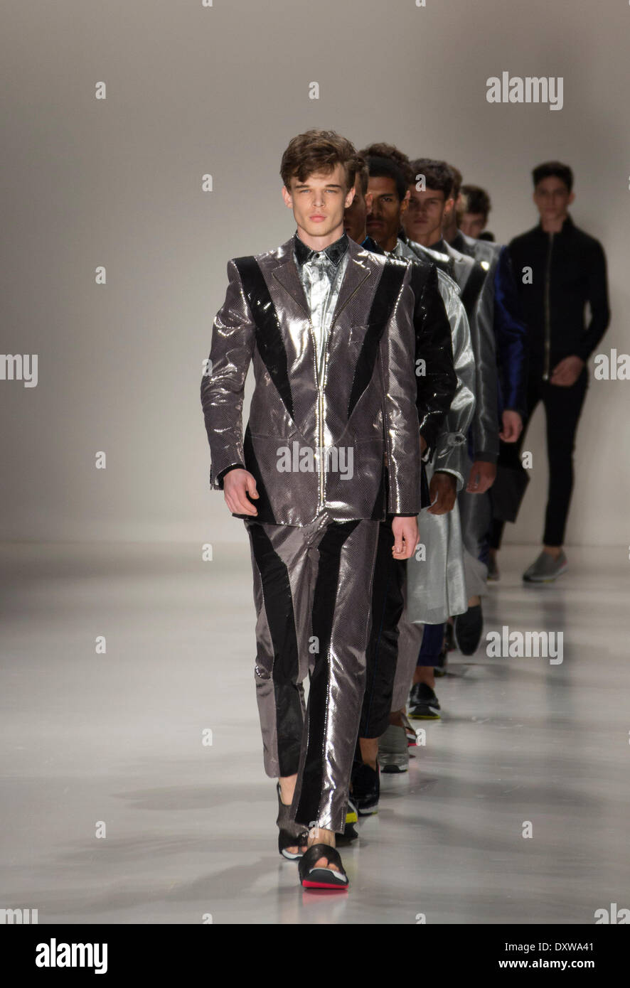 Sao Paulo, Brazil. 31st Mar, 2014. Models present creations of Joao ...