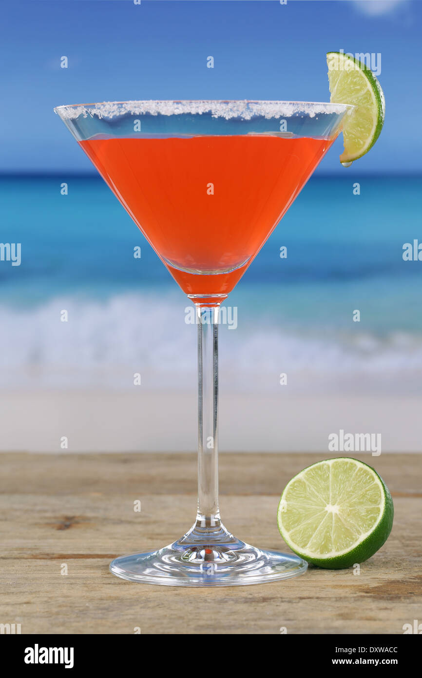 Martini cocktail on the beach while on vacation Stock Photo