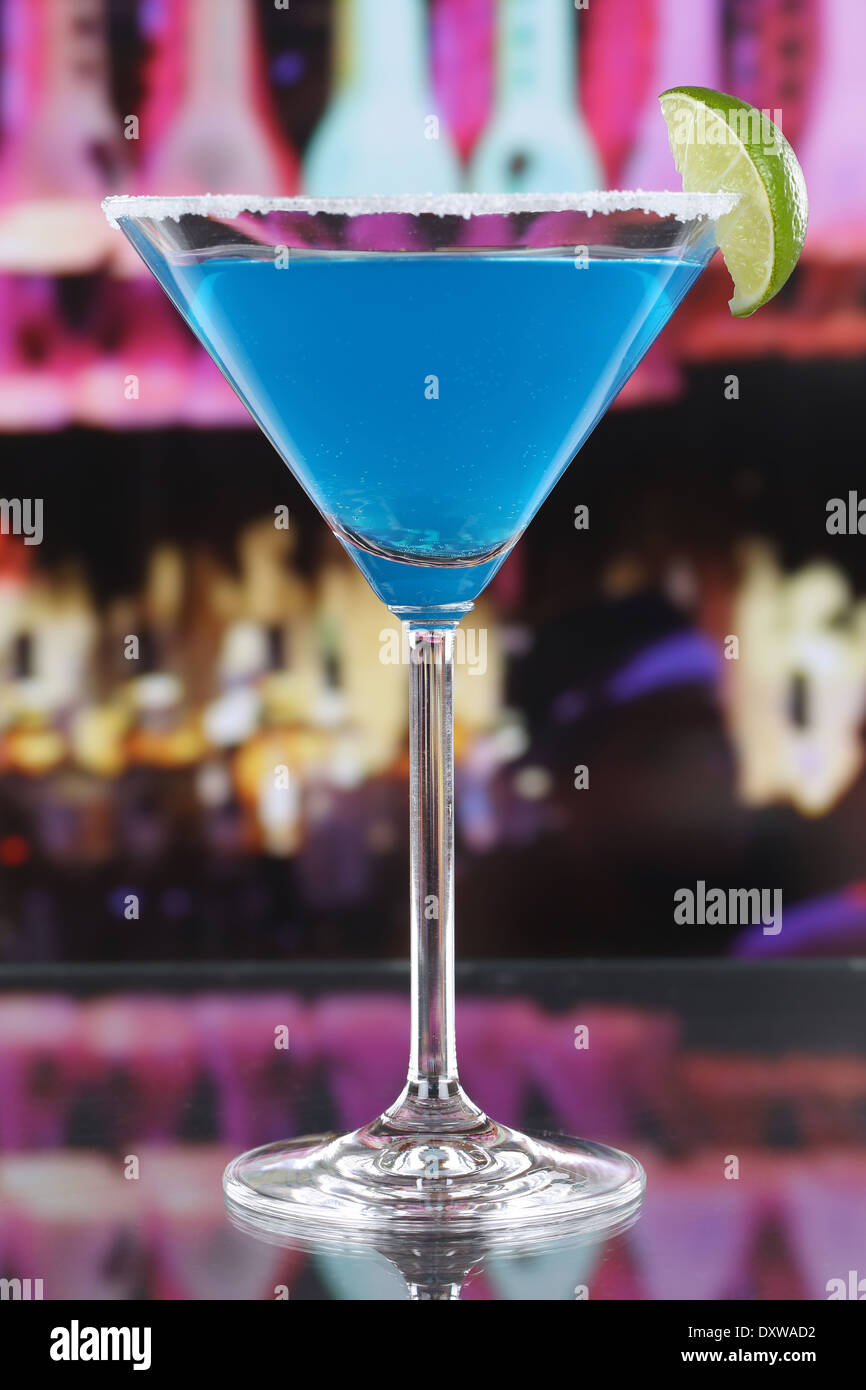 Blue Curacao cocktail in Martini glass in a bar or a party Stock Photo