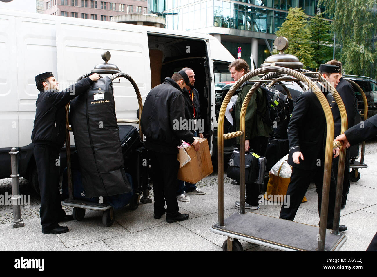 Luggage belonging to Jennifer Lopez is loaded into a truck outside Ritz Carlton Hotel persumably to be brought to O2 arena for her show tonight. Where: Berlin Germany When: 13 Oct 2012 Stock Photo