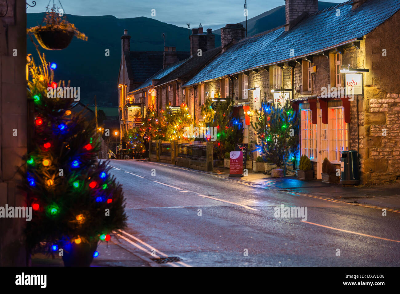 Christmas lights and trees illuminate the streets of Castleton in the