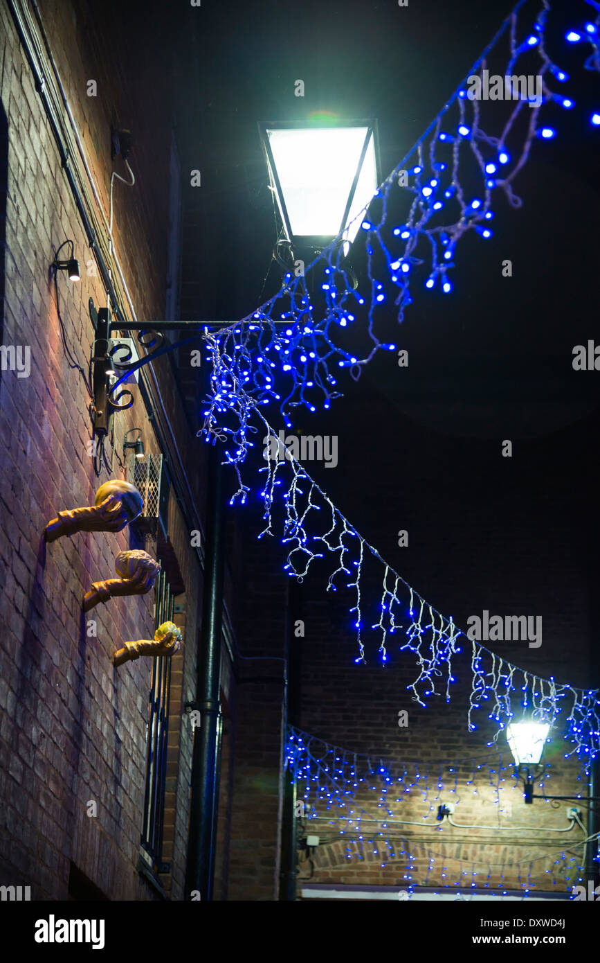 Christmas at night in Chesterfield town lit up with decorations and