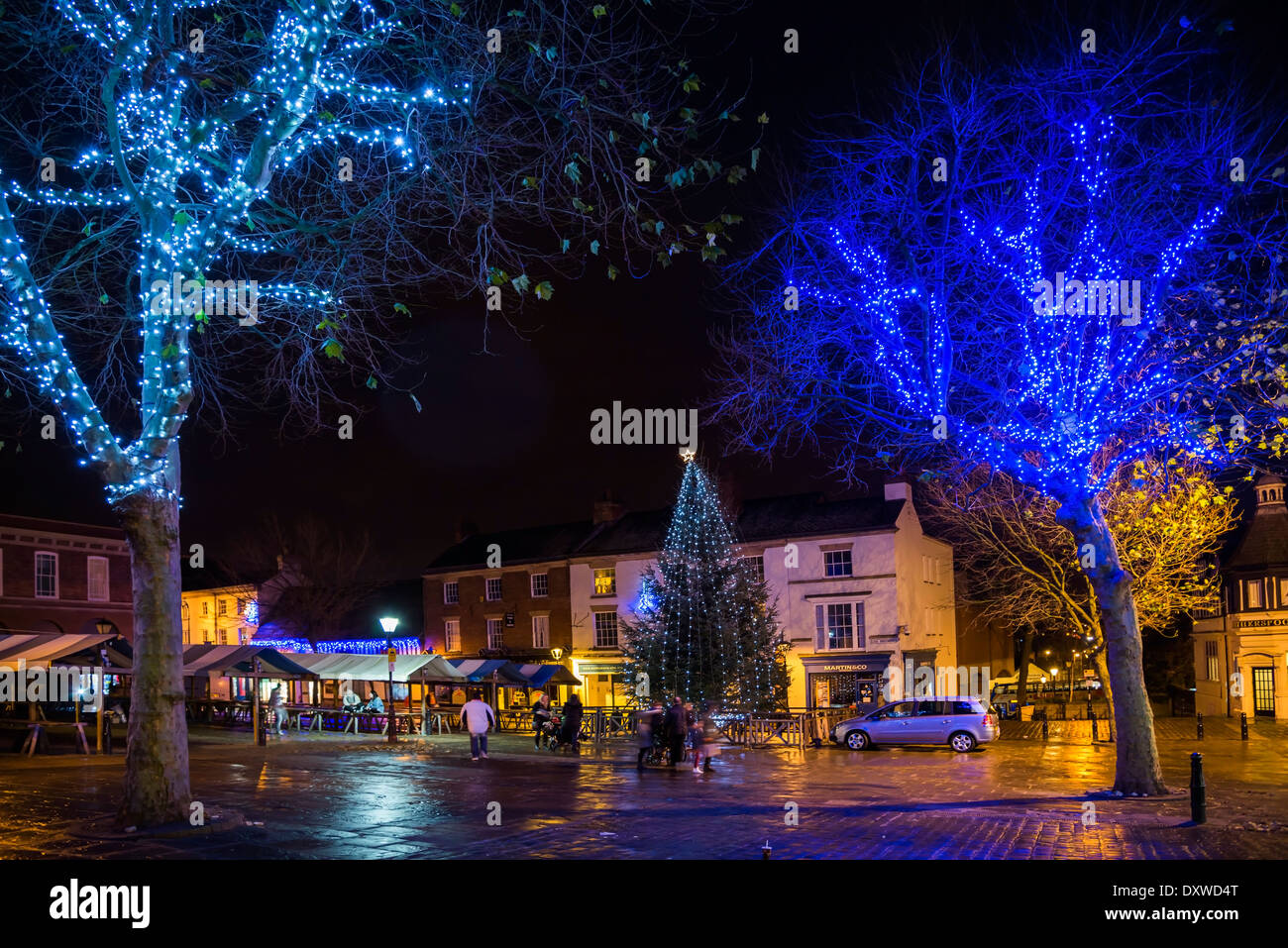 Christmas shoppers out late at night in Chesterfield town lit up with