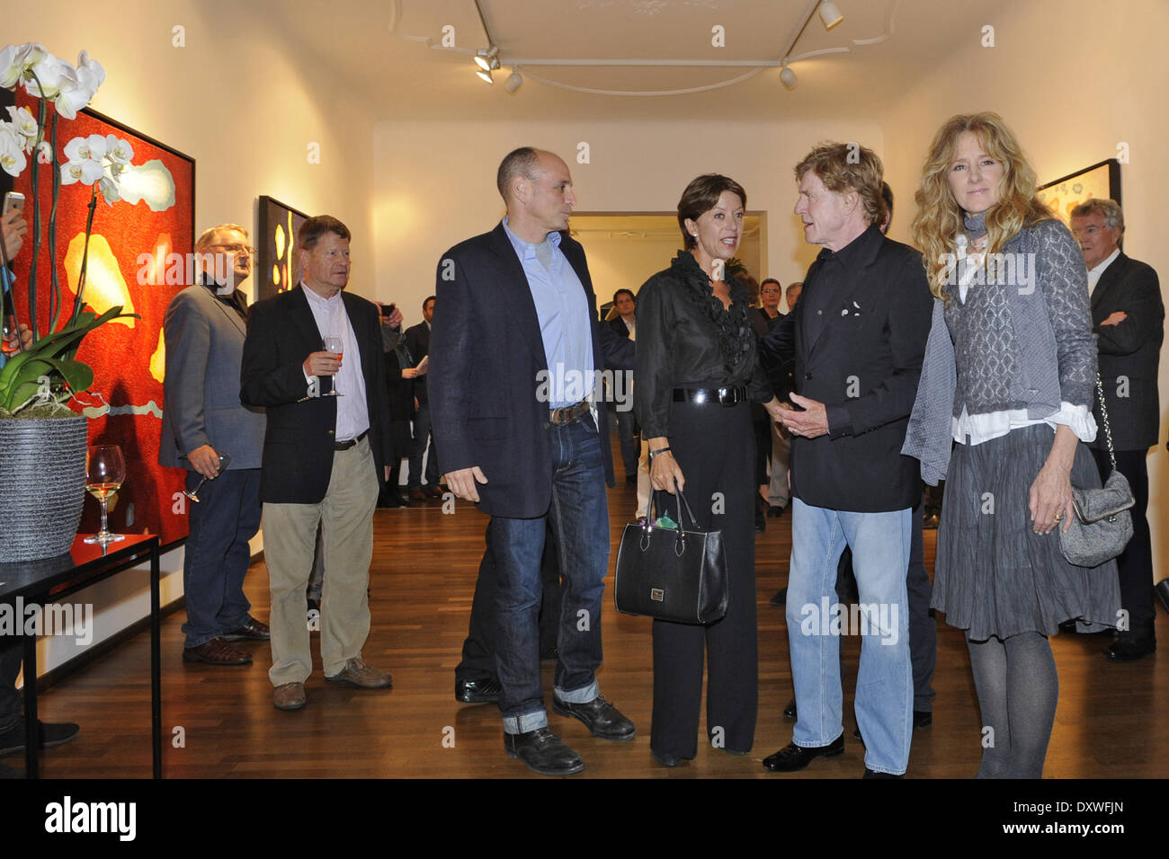 Sibylle Szaggars and her husband Robert Redford at a vernissage of