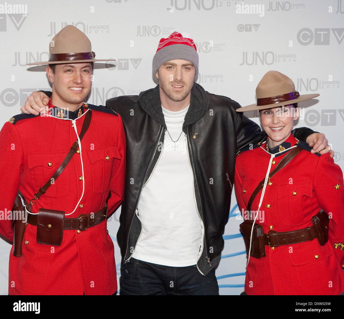 Winnipeg, Manitoba, Canada. 30th Mar, 2014. Classified arrives on the Red Carpet at the 2014 Juno Awards at the MTS Centre. © Heinz Ruckemann/ZUMA Wire/ZUMAPRESS.com/Alamy Live News Stock Photo