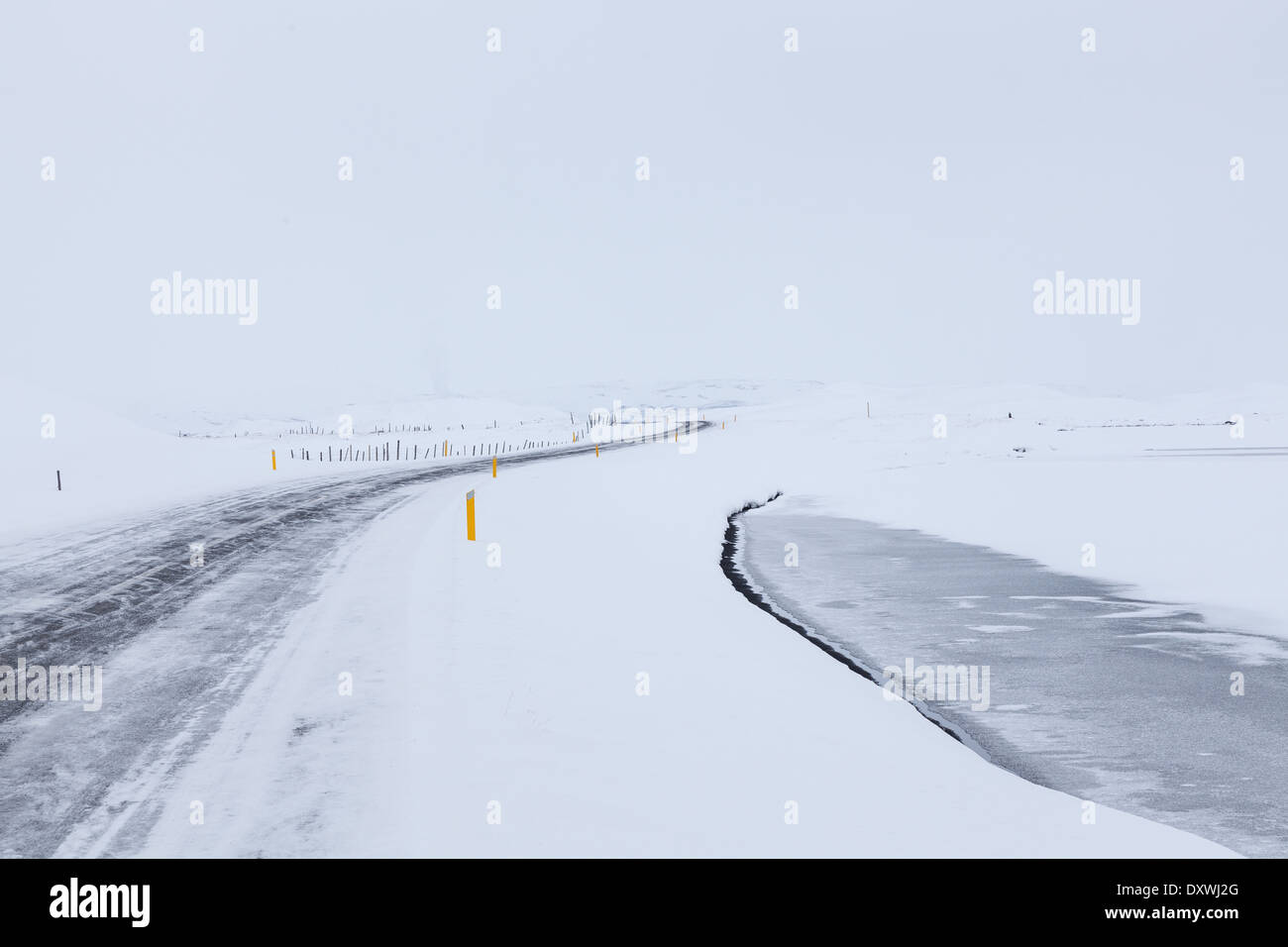 Icelandic road in Winter storm Stock Photo - Alamy