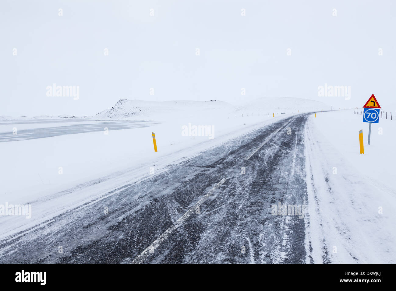 Icelandic road in Winter storm Stock Photo - Alamy