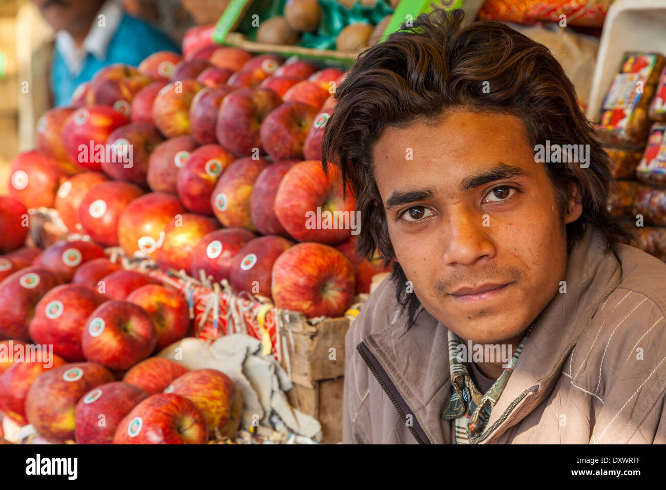 India, Dehradun. Young Man Selling Apples in the Market Stock Photo Alamy
