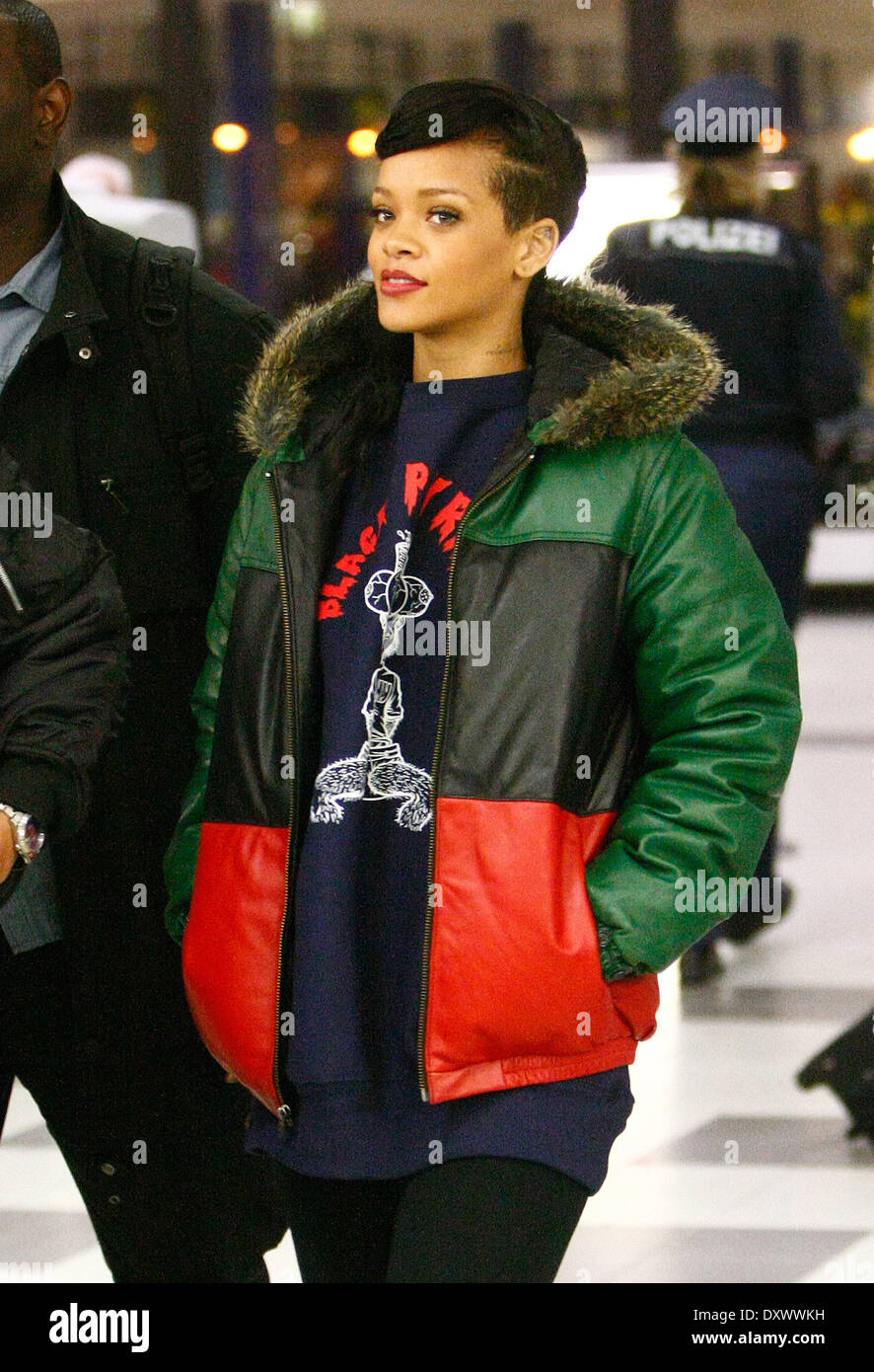 Rihanna at a security check at Schoenefeld airport after the secret concert during her 777 tour. Where: Berlin Germany When: 19 Nov 2012 Stock Photo