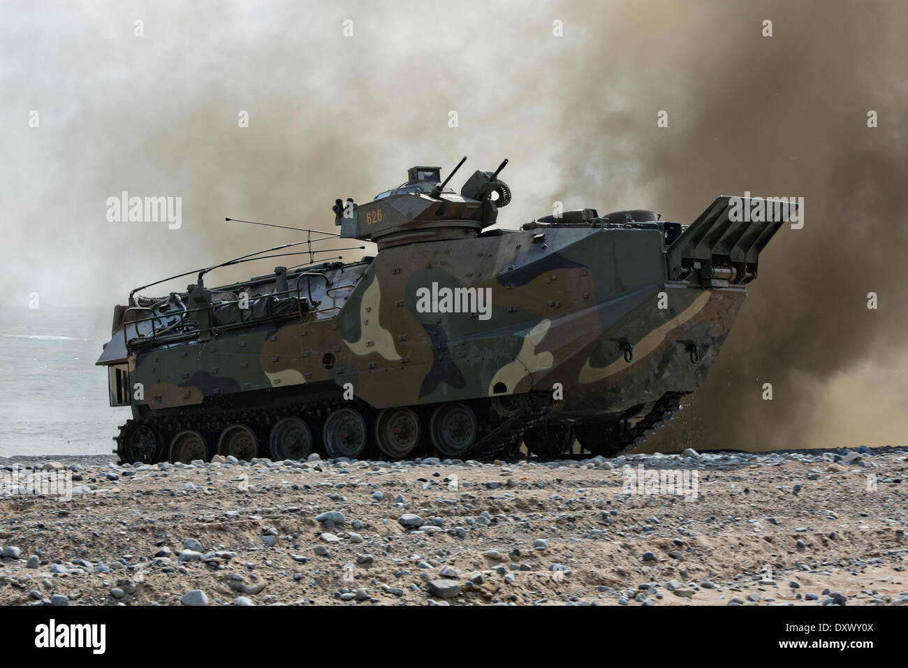 South Korean Marines amphibious assault vehicles roll on to the beach during a simulated amphibious assault part of joint training exercise Ssang Yong March 31, 2014 in Doksu-Ri, Pohang, South Korea. Stock Photo