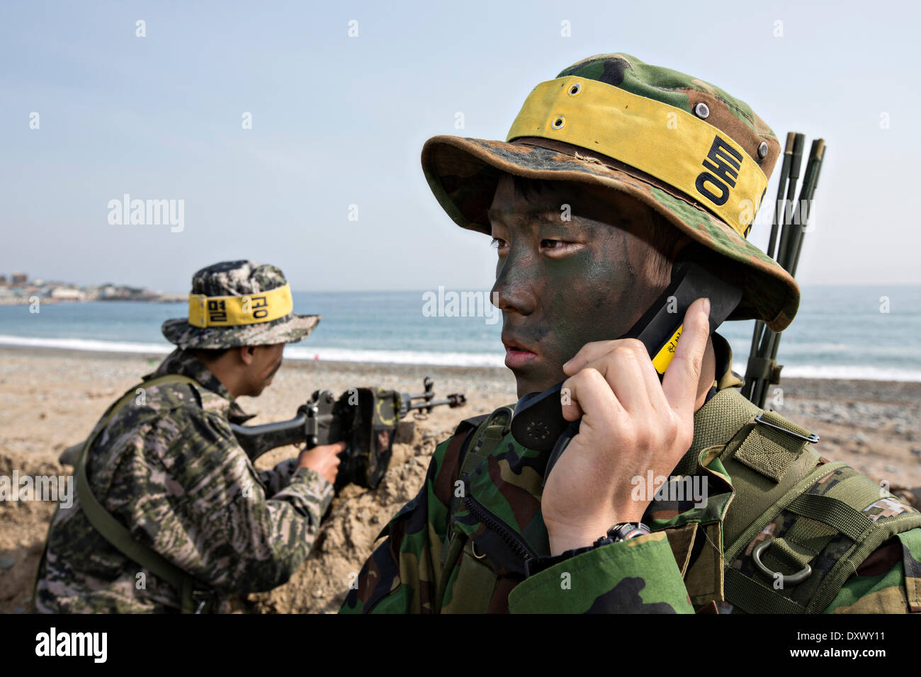 South Korean Marines during a simulated amphibious assault part of joint training exercise Ssang Yong March 31, 2014 in Doksu-Ri, Pohang, South Korea. Stock Photo