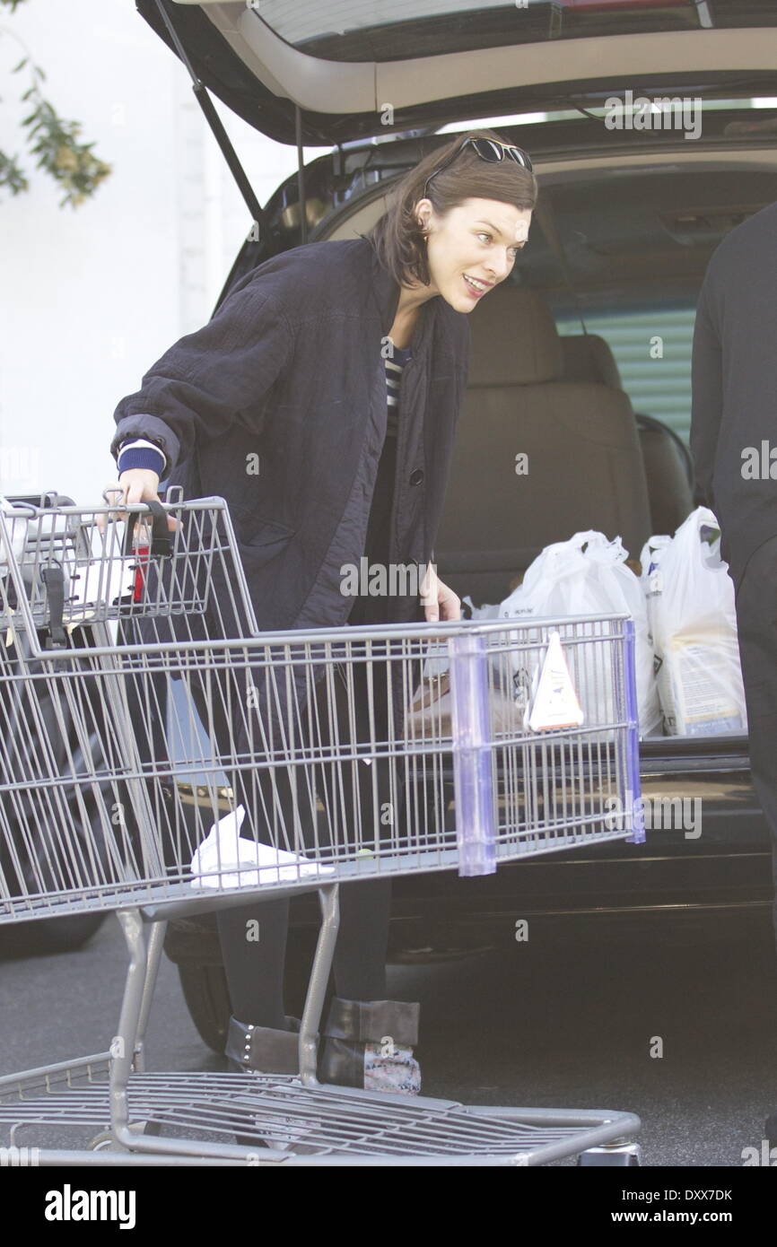 Milla Jovovich is seen shopping for Thanksgiving groceries at Bristol