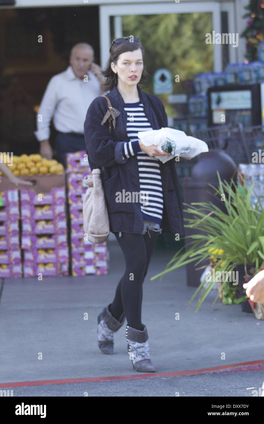 Milla Jovovich is seen shopping for Thanksgiving groceries at Bristol