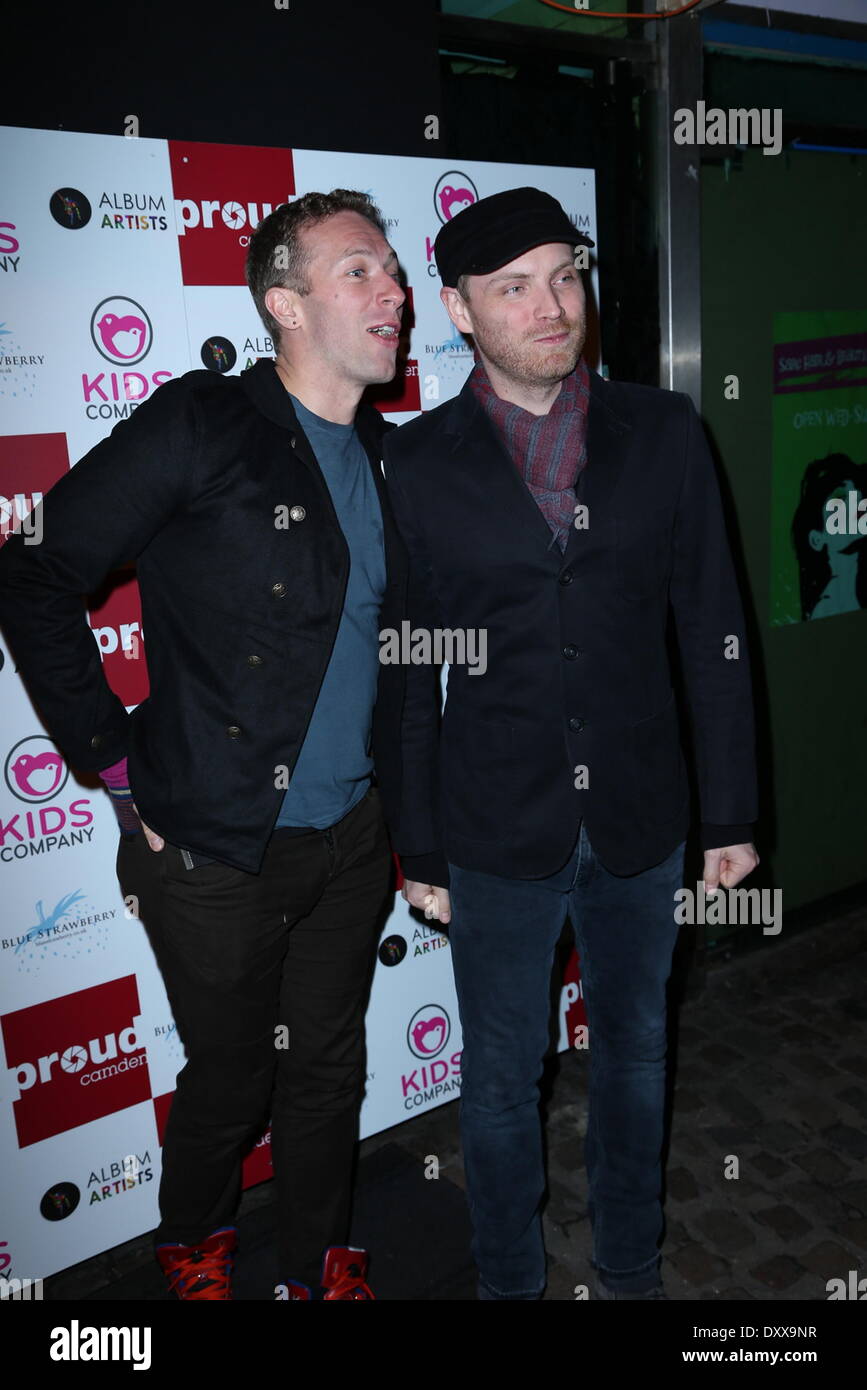 Chris Martin and Jonny Buckland of Coldplay Coldplay attend a party to celebrate the launch of graffiti artist Paris' latest exhibition. Items on show were used onstage during the band's recent Mylo Xyloto tour and feature artwork created by the band. Lon Stock Photo